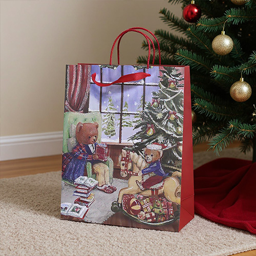 Kerstcadeautas met teddyberen en een kerstboom