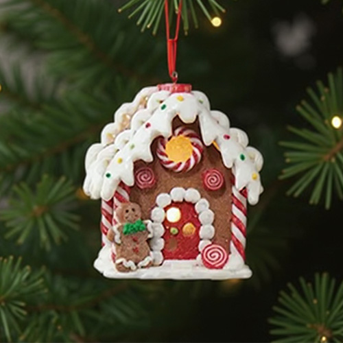 Peperkoekhuisje-ornament met een peperkoekenmannetje