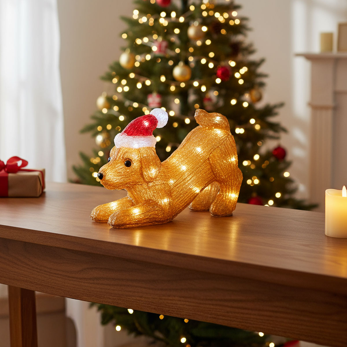 Chien lumineux de Noël avec un bonnet de Père Noël