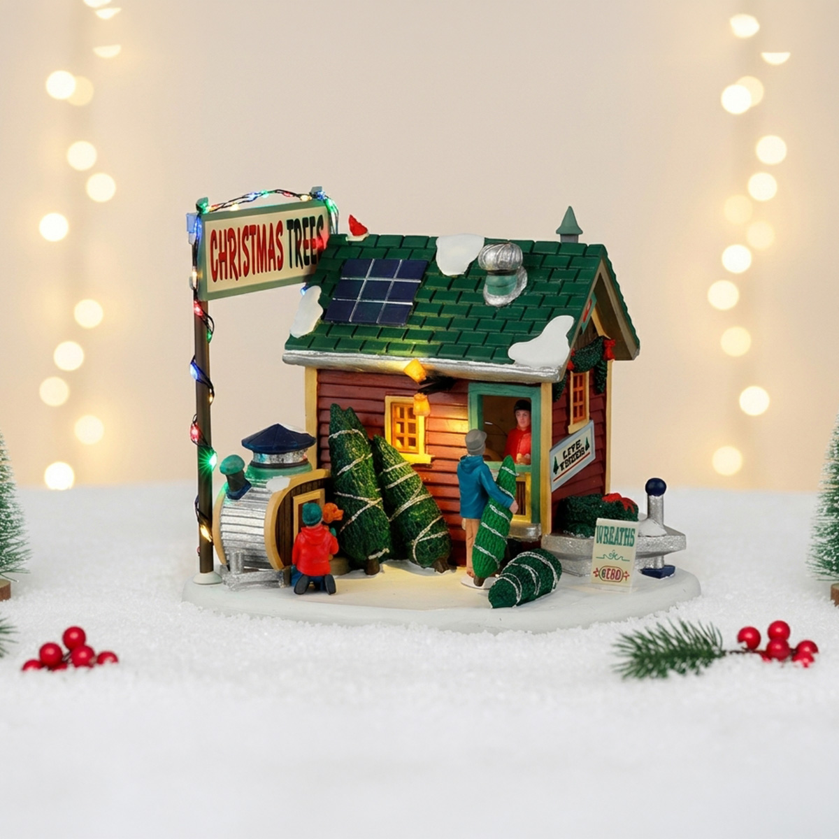 Maison de Noël avec vente d'arbres et de couronnes