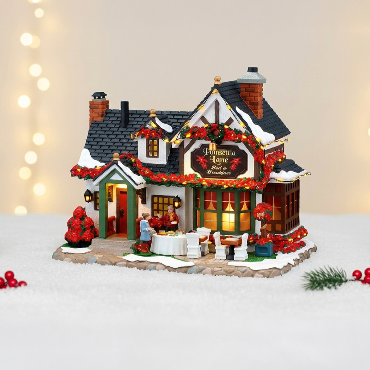 Maison de Noël Poinsettia Lane Bed & Breakfast décorée de lumières et de couronnes